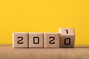 2021 new year background concept. Wooden and yellow background.