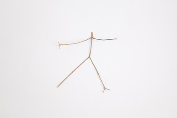 Zweig formt ein tanzendes Männchen
