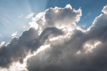 clouds and sunrays in summer 