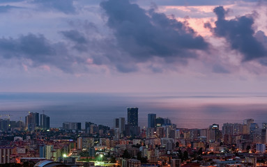 Fototapeta na wymiar Cloudy aerial Batumi cityscape in Georgia at evening