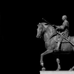 Fototapeta na wymiar Gattamelata bronze equestrian statue, in the historic center of Padua, erected by the famous renaissance artist Donatello in 1453 (Black and White with copy space)