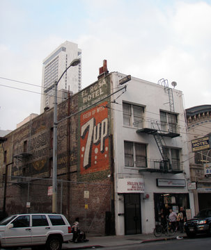 A Historic 7up ghost sign and a ghost sign for the El Rosa Hotel on side of Helen Hotel