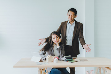Young business women are stressed about work The young businessman introduced her to soothe and heal stressed.