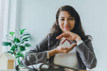 A beautiful young businessman working from home She is happy and relaxed at work.