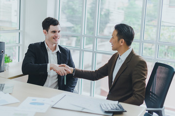 Business people can make business deals. The congratulatory handshake.