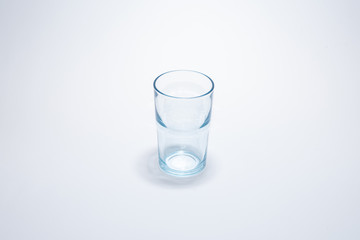 Traditional glass cup over white background
