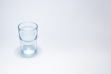 Traditional glass cup over white background