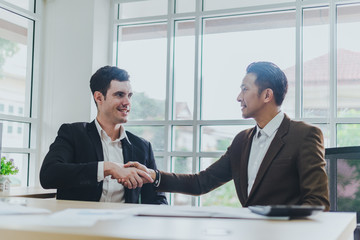 Business people can make business deals. The congratulatory handshake.
