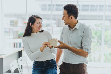 Asian couples, husbands and wives come together to design a house. To live together as a family in the future.