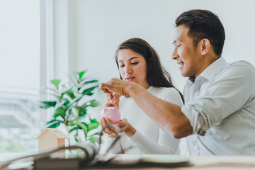 Asian couples, husbands and wives come together to design a house. To live together as a family in the future.