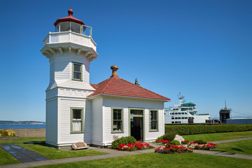 Mukilteo Lighthouse Washington State USA. The Mukilteo Lighthouse guiding mariners at sea....