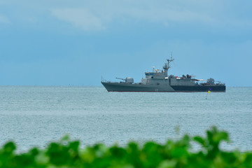 A large warship moored in the sea
At the Gulf of Thailand