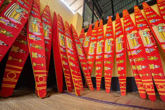 The Ceremonial bow, Onavillu. Artisan painting god's pictures on bow. It is made for annual rituals at Padmanabha swamy temple during Onam festival season.
