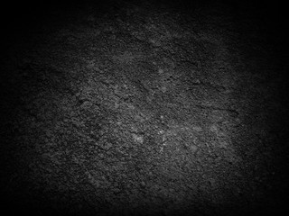 Background image of a black and white plaster wall surface. Distinctive product background. Images that are strong, seductive, attractive.