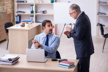 Two employees in the office
