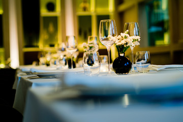 cocktail glass on the table, night party, celebration, glass water
