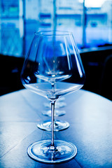 cocktail glass on the table, night party, celebration, glass water
