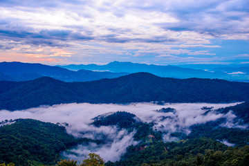 Beautiful landscape with Misty morning sunrise at Doi Mon Ngao View point, Chiang mai in northern Thailand