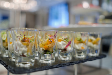 Glass shots  pastry, wedding catering food, mini canapes,  tasty dessert,  snacks and appetizers
