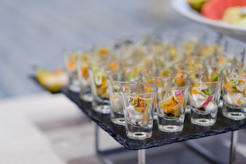 Glass shots  pastry, wedding catering food, mini canapes,  tasty dessert,  snacks and appetizers
