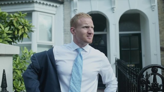 Busy Business Man Commuting to Work, Putting on Suit Jacket - Lockdown