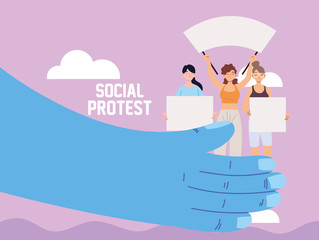 hands supporting women with signs and megaphone at a social protest