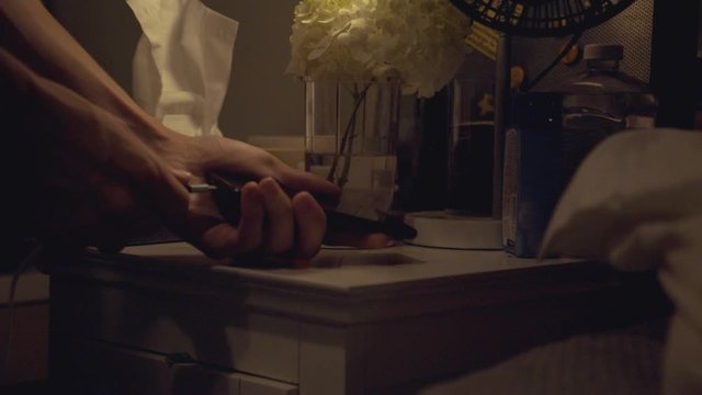 Man's Hand Connecting The Charging Cable To The Cellphone - Slow Motion