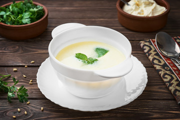 Homemade Turkish yogurt soup (yayla soup), seasonal, summer soup, served hot or cold. Healthy wholesome food, the first starter dish. Close up
