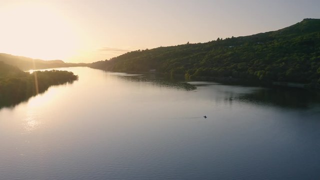 Brilliant Sunrise At The Calm Lake Of Llyn Padarn In Llanberis Snowdonia, Wales - Wide Shot