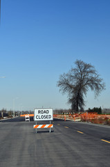Road closed sign on new road