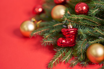 Christmas banner. Xmas design red christmas tree decorations on a red background. Horizontal christmas poster, greeting cards, headers, website.