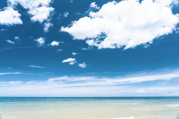 Turquoise blue sea with white sand and sunny sky in summer with copy space