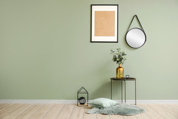Interior of modern room with mirror and table