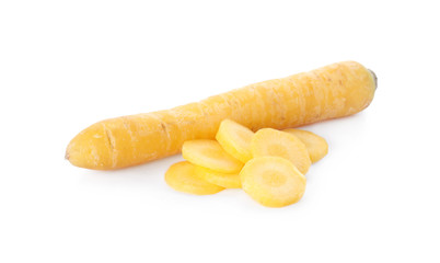 Cut and whole yellow carrots isolated on white