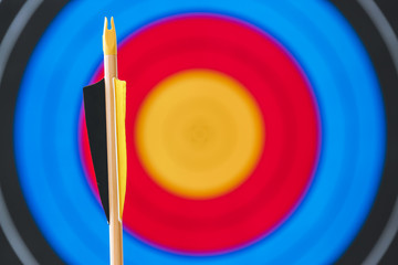 Arrow for archery against target on wall, closeup