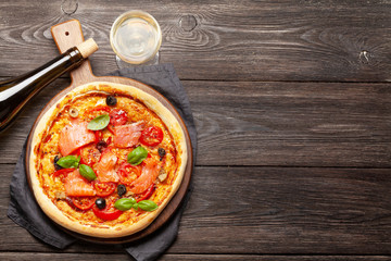 Tasty homemade seafood pizza with salmon
