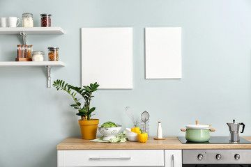 Set of utensils and products on kitchen counter