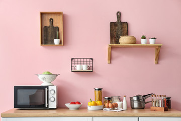 Set of utensils and products on kitchen counter