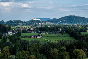 Fototapeta na wymiar landscape with mountains and trees - city of salzburg
