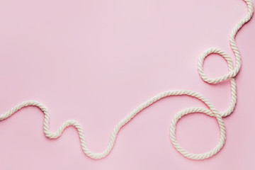 Long rope on color background