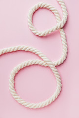 Long rope on color background