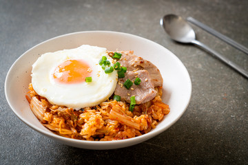 Kimchi fried rice with fried egg and pork