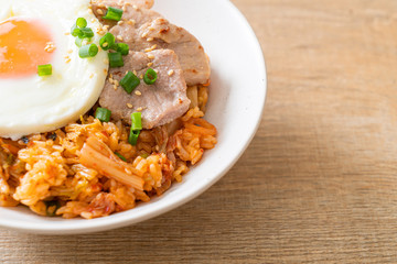 Kimchi fried rice with fried egg and pork