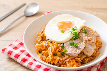 Kimchi fried rice with fried egg and pork