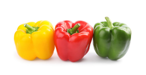 Fresh ripe colorful bell peppers isolated on white