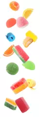 Fototapeten Different delicious candies falling on white background © New Africa
