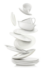 Set of clean dishes and cups in flight on white background