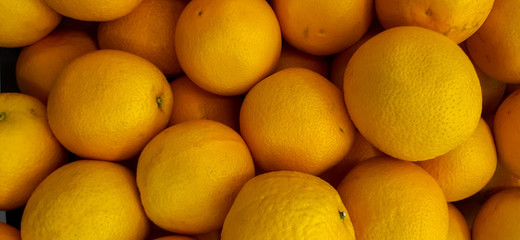 background from oranges. a lot of fruits.