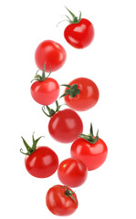 Many whole tomatoes falling on white background