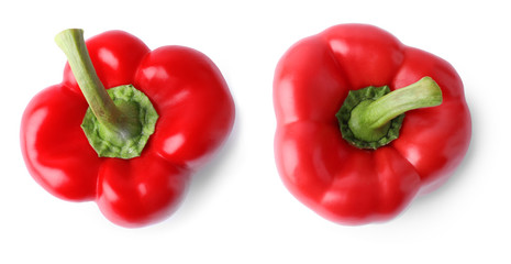 Red bell peppers on white background, top view